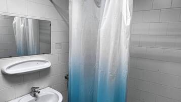 Shower, towels, soap, shampoo