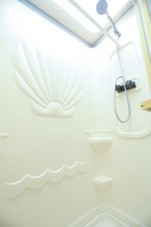 Shower, towels, soap, shampoo