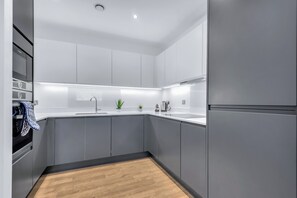 Departamento, 2 habitaciones, para no fumadores, cocineta | Cocina privada | Tetera eléctrica