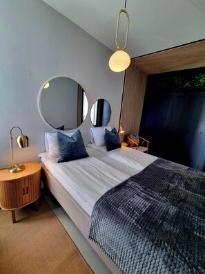 Apartment, Sea View | Down comforters, individually furnished, desk, laptop workspace - A-11 (Ålesund)