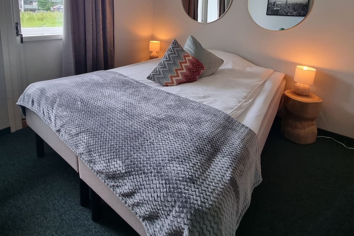 Standard Double Room with Shared Bathroom | Down comforters, individually furnished, desk, laptop workspace