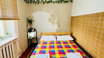 Quadruple Room | Memory-foam beds, blackout curtains, soundproofing, iron/ironing board
