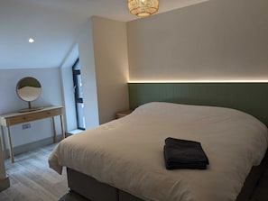 2 dormitorios, tabla de planchar con plancha, wifi gratis y ropa de cama