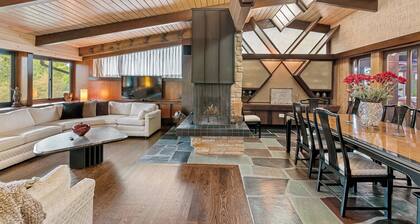 Spacious MCM home blends elegance w/ retro charm. Includes pool, steam and sauna