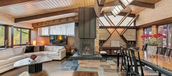 Spacious MCM home blends elegance w/ retro charm. Includes pool, steam and sauna