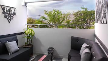 Chambre Classique Double ou avec lits jumeaux, vue ville | Coin séjour | Télévision