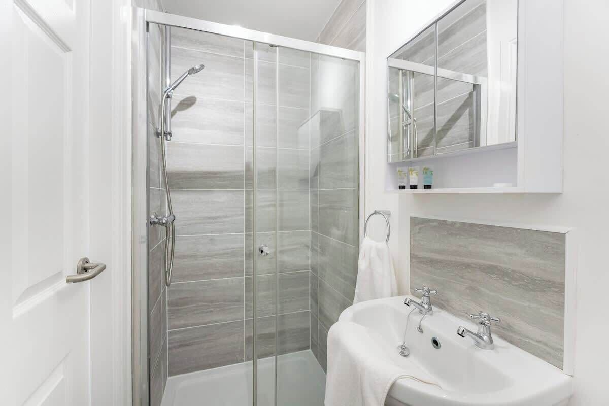 Shower, hair dryer, shampoo