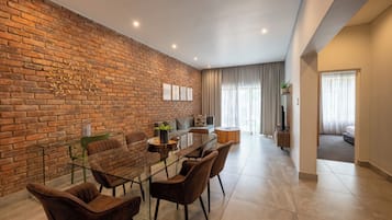 Apartment, 2 Bedrooms | Living area | 32-inch flat-screen TV with satellite channels