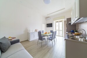 Apartment | Living area | 35-inch TV with digital channels