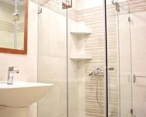 Shower, hair dryer, towels