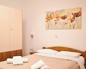 1 quarto, Wi-Fi de cortesia, roupa de cama