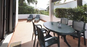 Outdoor dining - Apartment 'Apartamento 1 Dormitorio II' with Private Terrace and Shared Garden (Son Xoriguer)