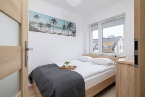 Apartment, 1 Bedroom, Balcony | 1 bedroom, desk, laptop workspace, bed sheets - Air-conditioned Apartment by Renters (Wieliczka)