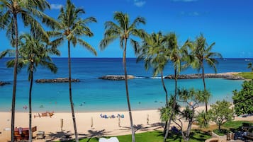 On the beach, sun loungers, beach towels