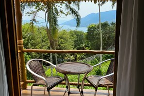 Cabaña Deluxe, vista parcial al mar | Vista desde la habitación