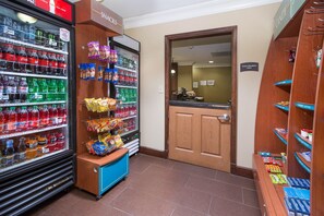 A vending area with various snacks and drinks.
