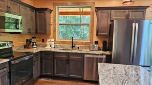 Fridge, microwave, oven, stovetop - Riversong Elegance - New construction, family-friendly cabin, quiet neighborhood (Sevierville)