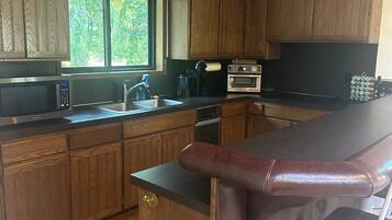 Microwave, stovetop, coffee/tea maker, blender