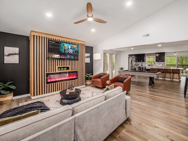 Smart TV, fireplace, books