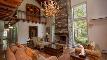House | Living area | 50-inch Smart TV with digital channels, fireplace