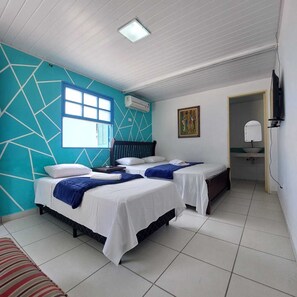 Comfort Triple Room | Bed sheets - POUSADA CANTINHO DO GUARUJÁ (Guarujá)