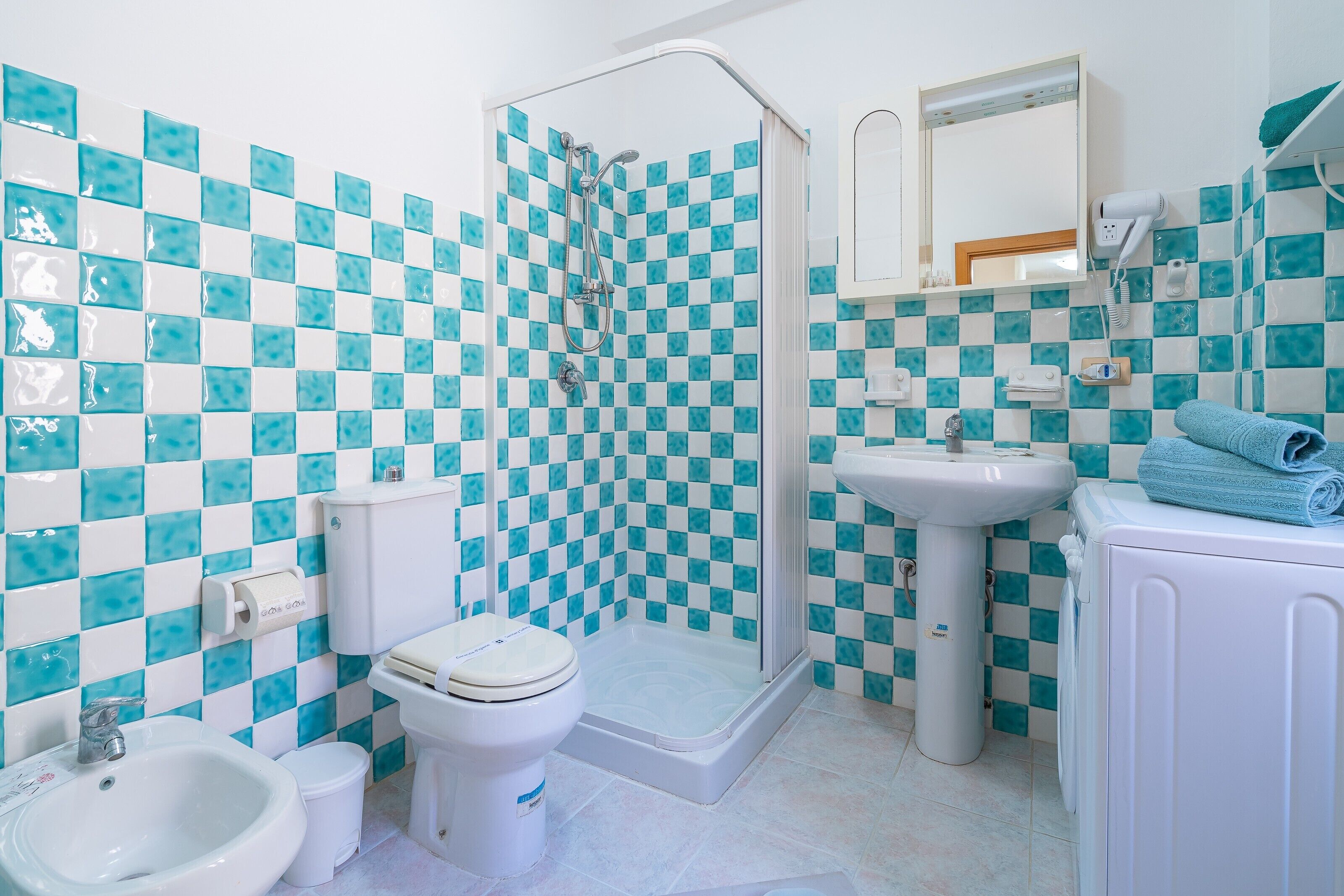 Shower, free toiletries, hair dryer, towels