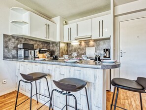 Fridge, microwave, cookware/dishes/utensils