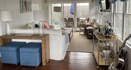 Bright airy Fair Harbor home with ocean views steps from the soft sandy beach