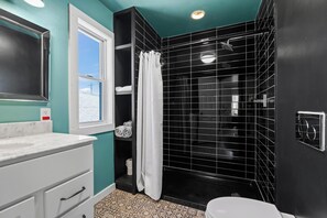 Shower, hair dryer, towels, soap