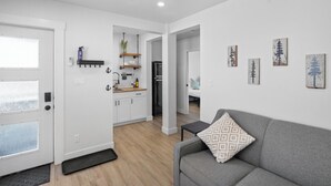 Living area - Charming Riverside Suite | Kitchenette, BBQ, Dock (Lake Cowichan)