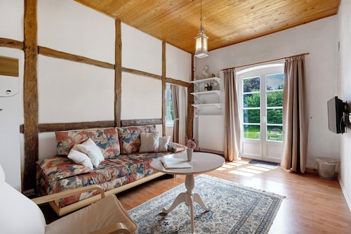 Ferienwohnung 'Fachwerkzimmer' mit Gemeinschaftsgarten und WLAN