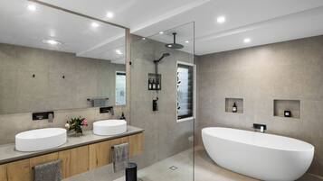 Shower, eco-friendly toiletries, towels, soap