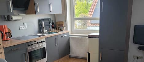 Réfrigérateur, four, plaque de cuisson, lave-vaisselle