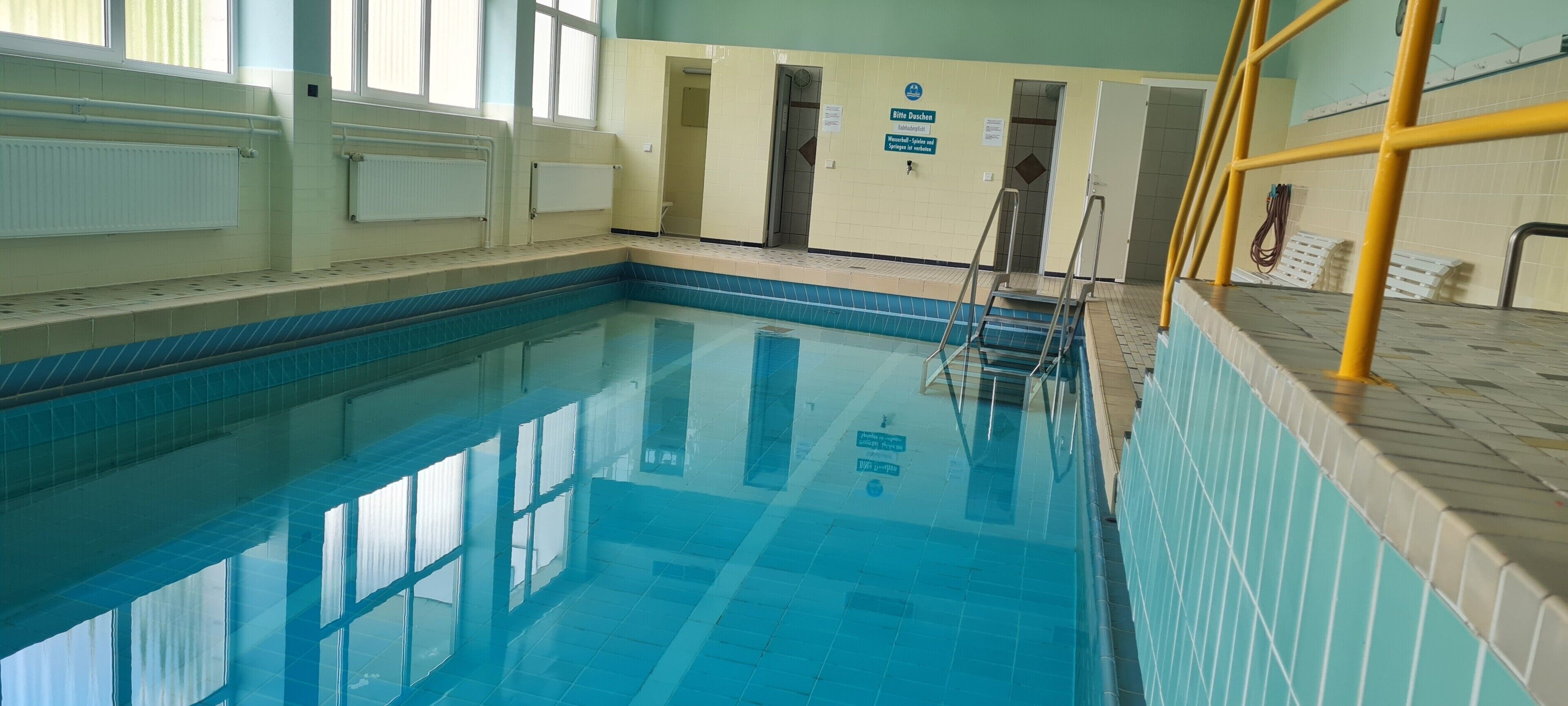 Alberca techada y alberca climatizada