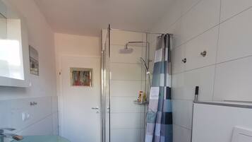 Shower, free toiletries, hair dryer, towels