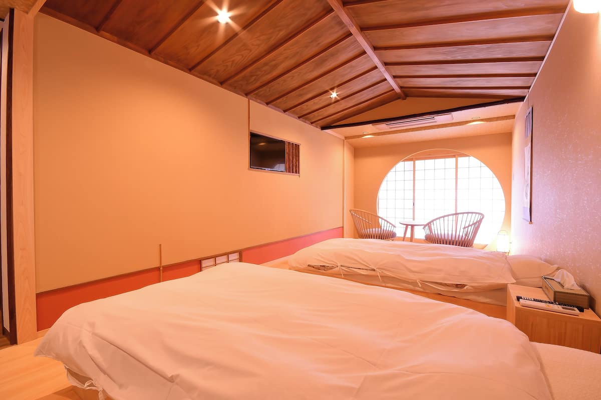 Deluxe Twin Room | 1 bilik tidur, peti besi dalam bilik, Wi-fi percuma