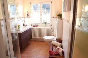 Shower, free toiletries, hair dryer, towels