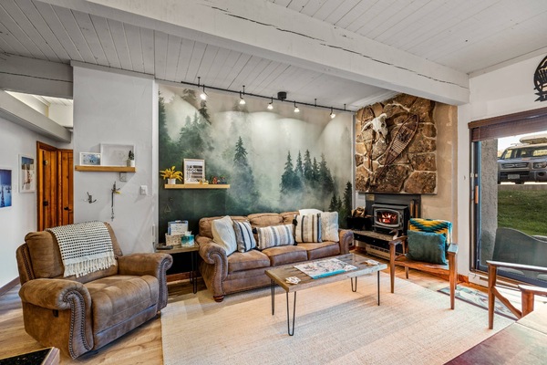 Cozy and fun decor in our living space, with wood burning fireplace.