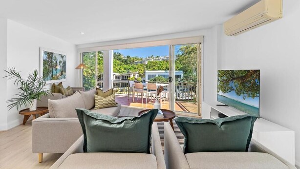 Living area - Top Floor Riverfront Apartment! (Noosa)