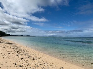 On the beach, sun-loungers, beach towels
