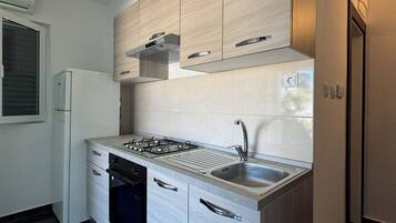 Apartment, Balcony, Sea View | Private kitchen | Electric kettle