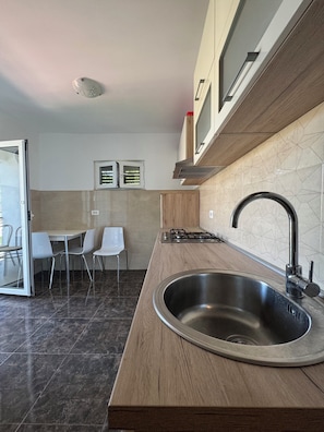 Apartment, Balcony, Sea View | Private kitchen | Electric kettle - Apartments Villa Bella (Okrug)
