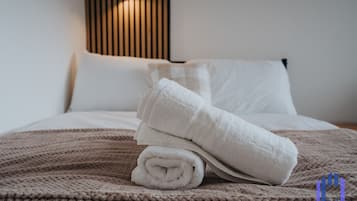 1 bedroom, desk, iron/ironing board, travel crib