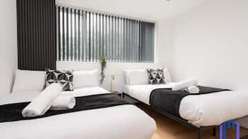 2 bedrooms, desk, iron/ironing board, travel crib