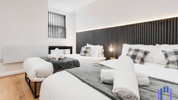 2 bedrooms, desk, iron/ironing board, travel crib