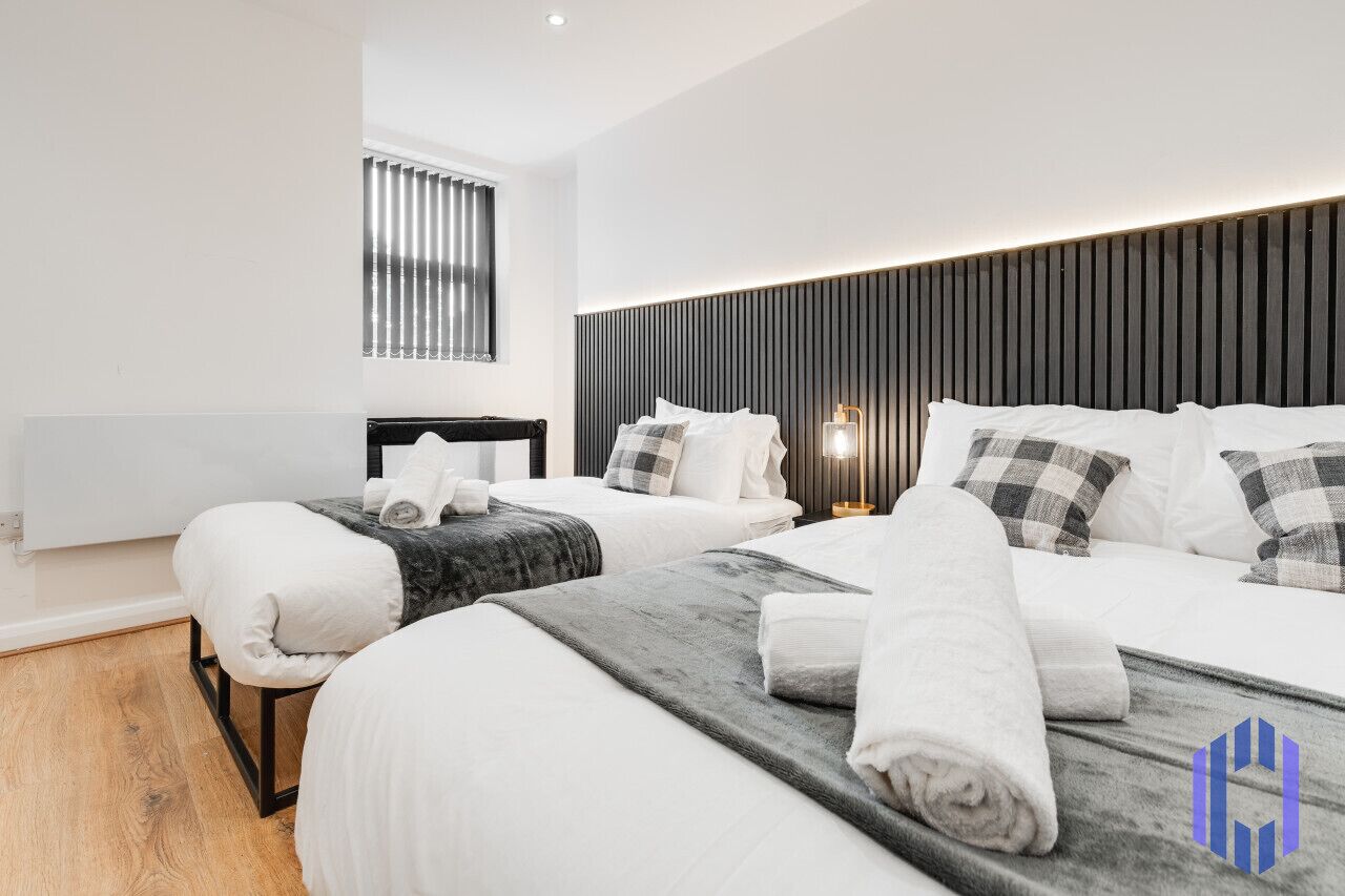 2 bedrooms, desk, iron/ironing board, travel crib