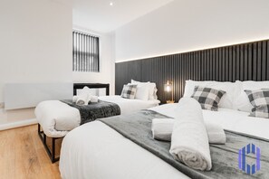 2 bedrooms, desk, iron/ironing board, travel cot