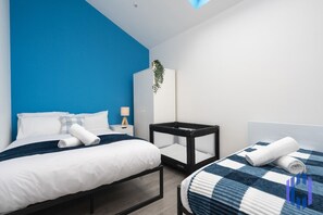 2 bedrooms, desk, iron/ironing board, travel crib