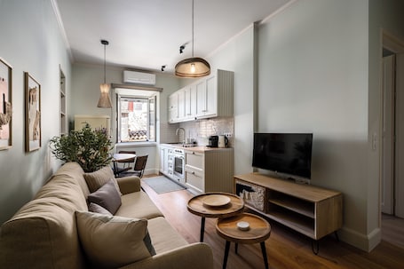 Superior Apartment, 1 Bedroom | Living area | 40-inch flat-screen TV with digital channels