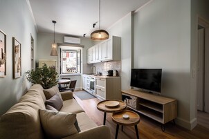 Superior Apartment, 1 Bedroom | Living area | 40-inch flat-screen TV with digital channels